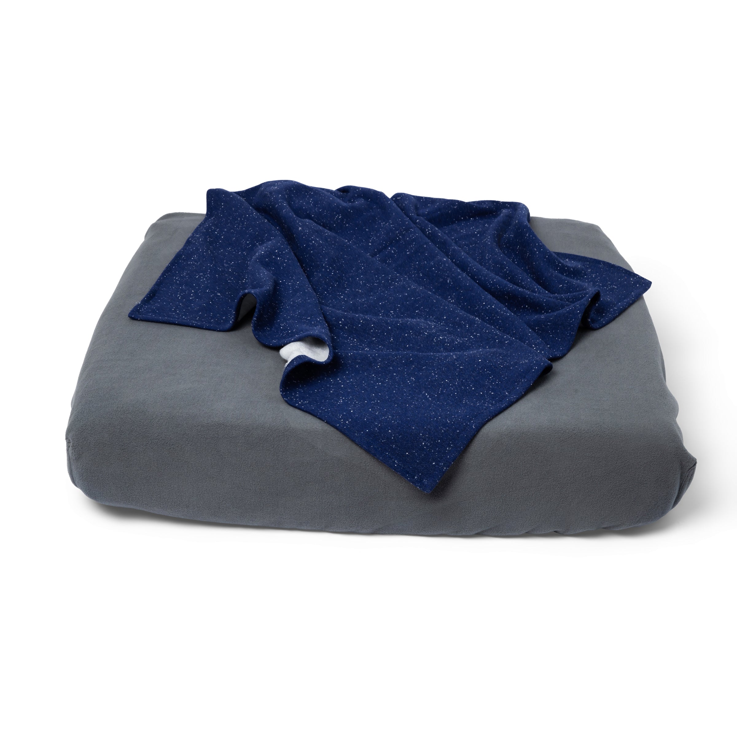 Blue Toby Blue Sky Blanket on grey bed folded
