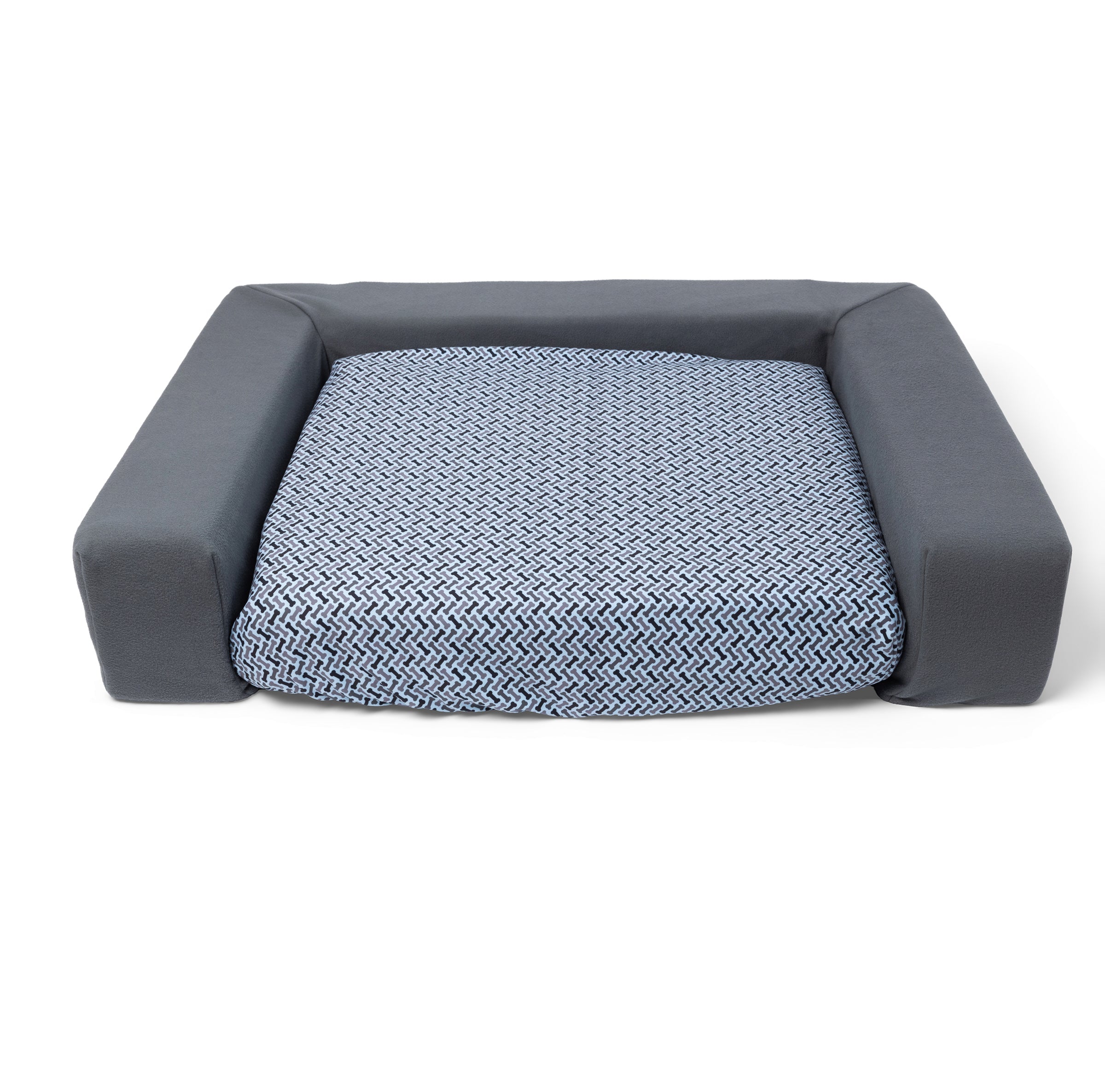 Blue Toby bolster in grey with bed in Toby Bone slipcover