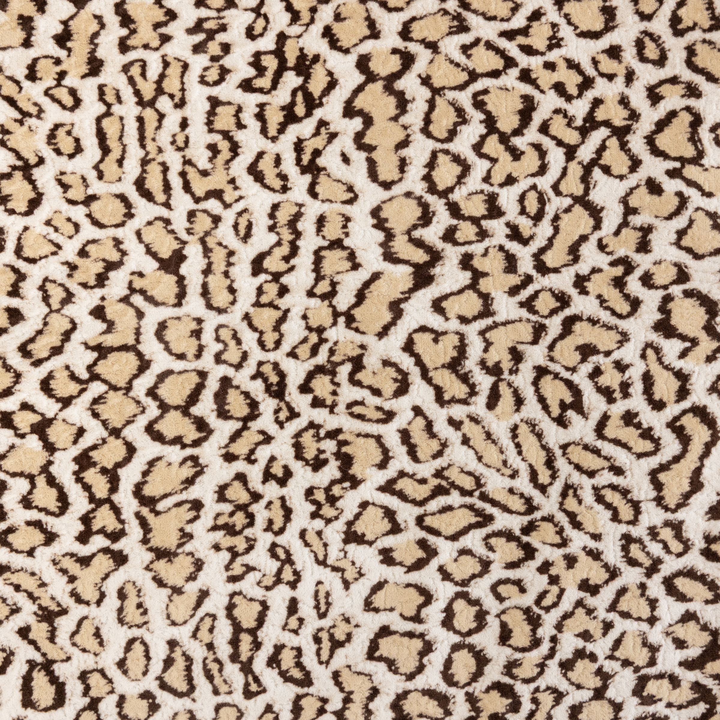 Blue Toby Ocelot Luxe faux fur blanket showing tan, brown, and cream velvet cat print side