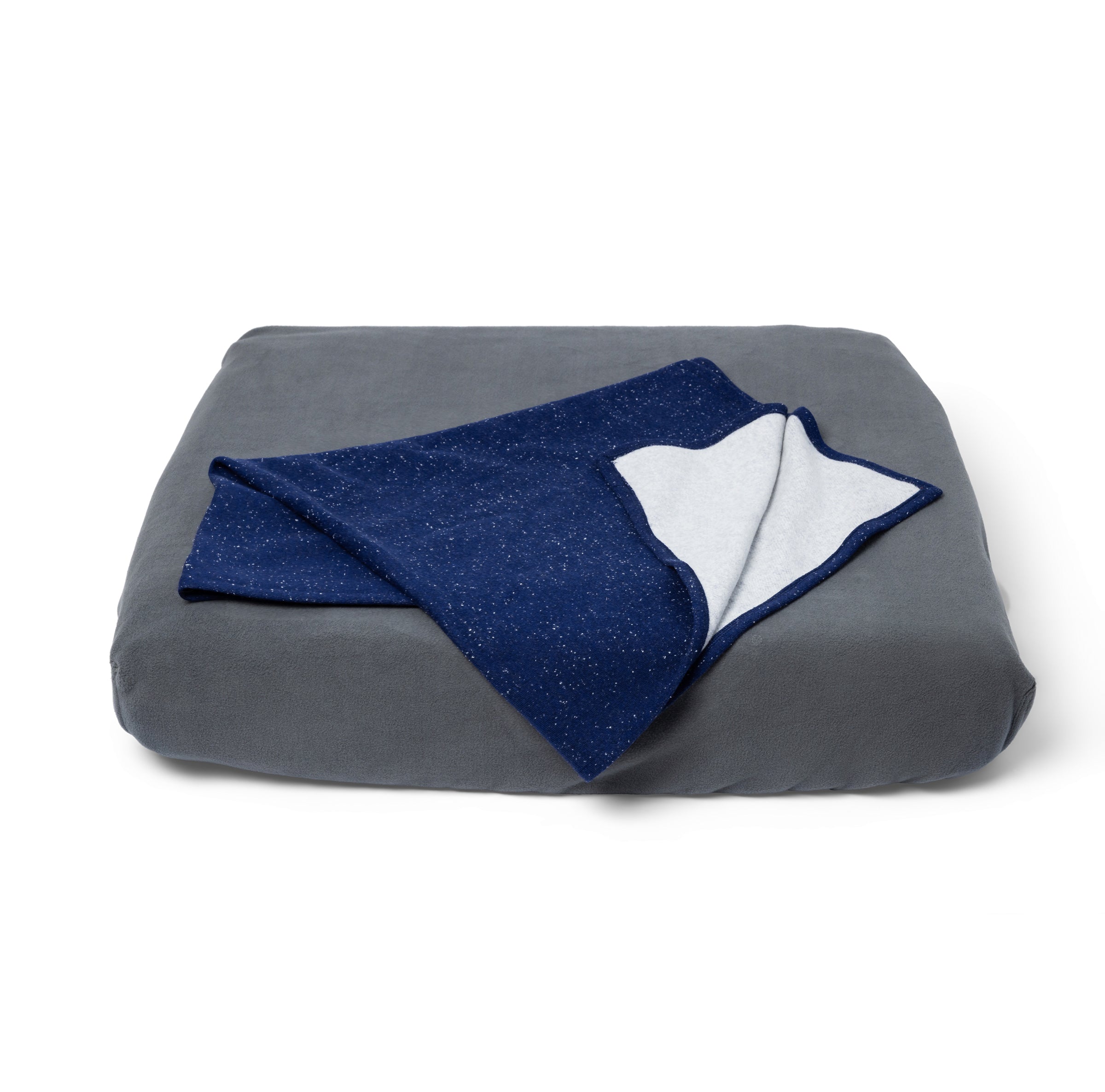 Blue Toby Blue Sky Blanket on grey bed