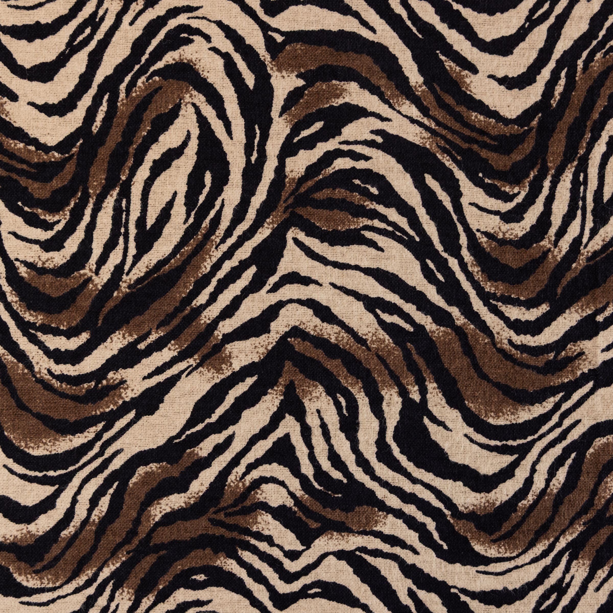 Zebra print pattern with brown and black stripes on a Blue Toby cotton flannel blanket.