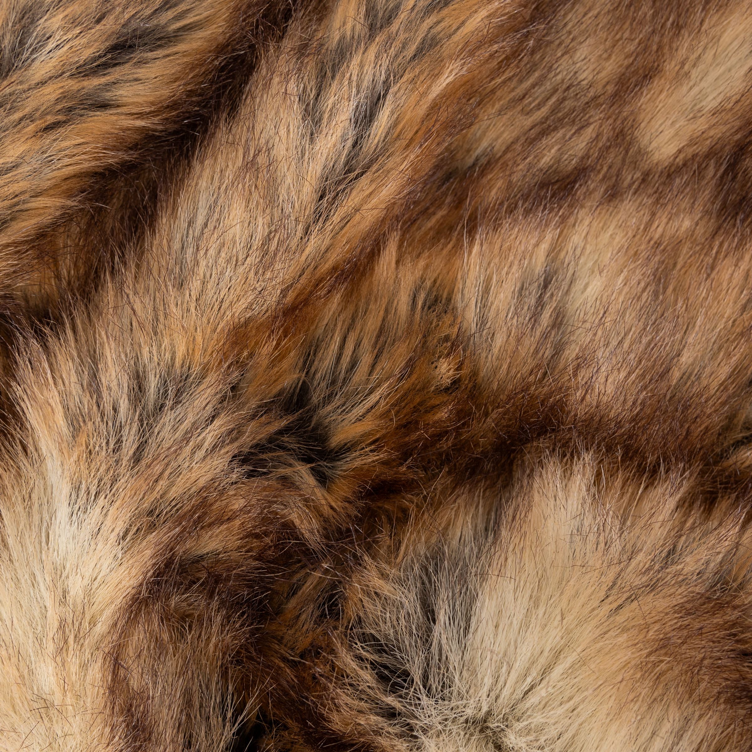 Close-up of brown and black long fur texture of the Blue Toby Artic faux fur blanket